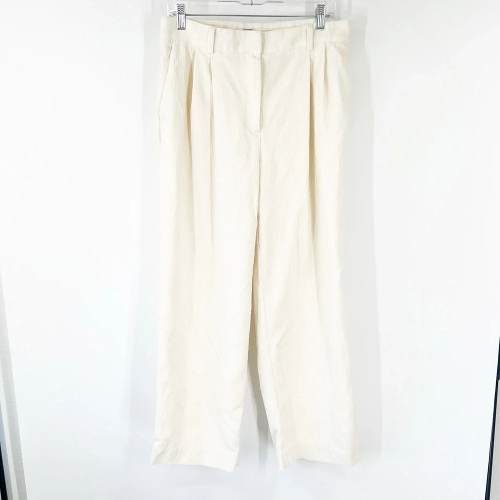 Toteme Pleated Silk and Organic Cotton-Blend Corduroy Wide-Leg Pants in Ecru - Picture 2 of 11